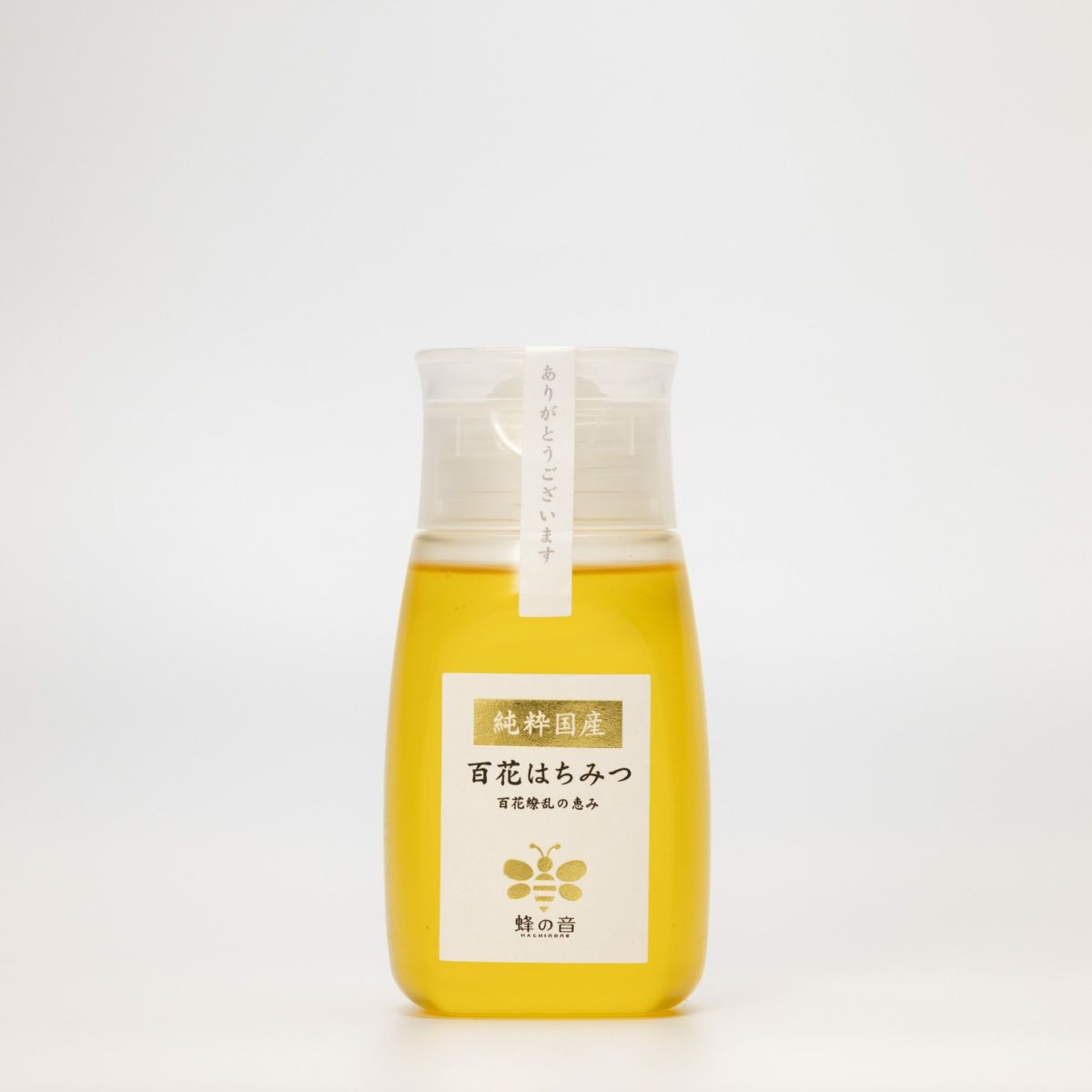 四季折々に咲く様々な花から採蜜し厳選した「国産百花はちみつ」の商品画像。時期や採蜜場所で風味が異なる、四季の恵みを感じるはちみつ。