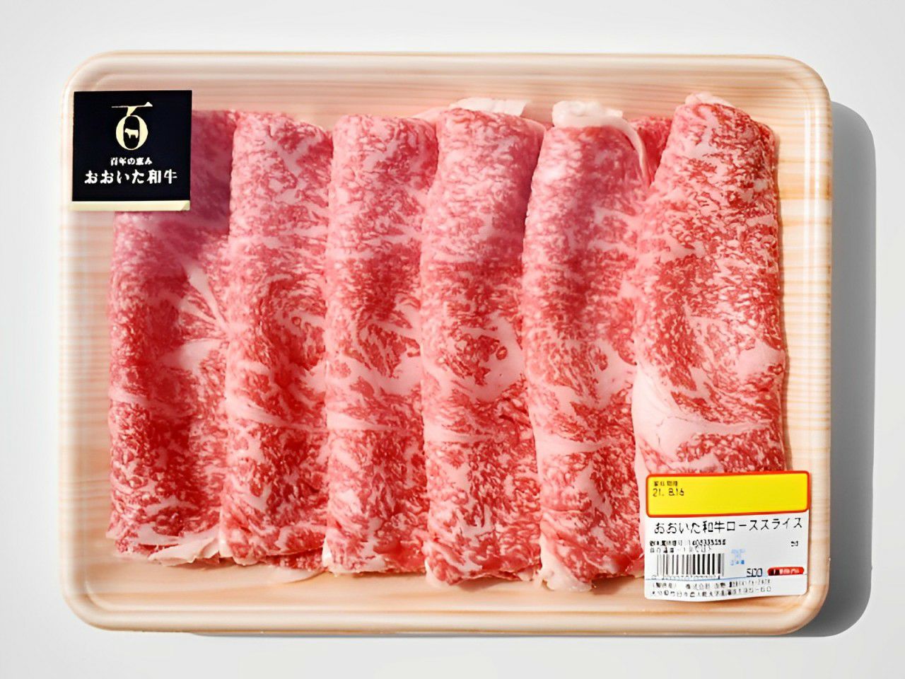大分県のブランド牛「おおいた和牛（黒毛和牛）」のすき焼き・しゃぶしゃぶ用ロース肉がパックまたは箱に詰められた内容量画像。贈答用やお祝いにも最適な、通販お取り寄せ高級和牛。
